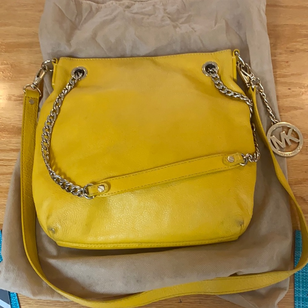 Michael kors yellow/gold crossbody bag.